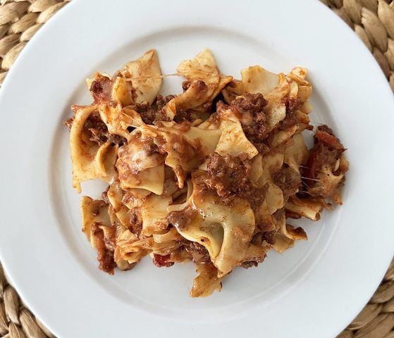 Plate of Greek spaghetti made like traditional spaghetti but with different spices making it a delicious new spin on spaghetti